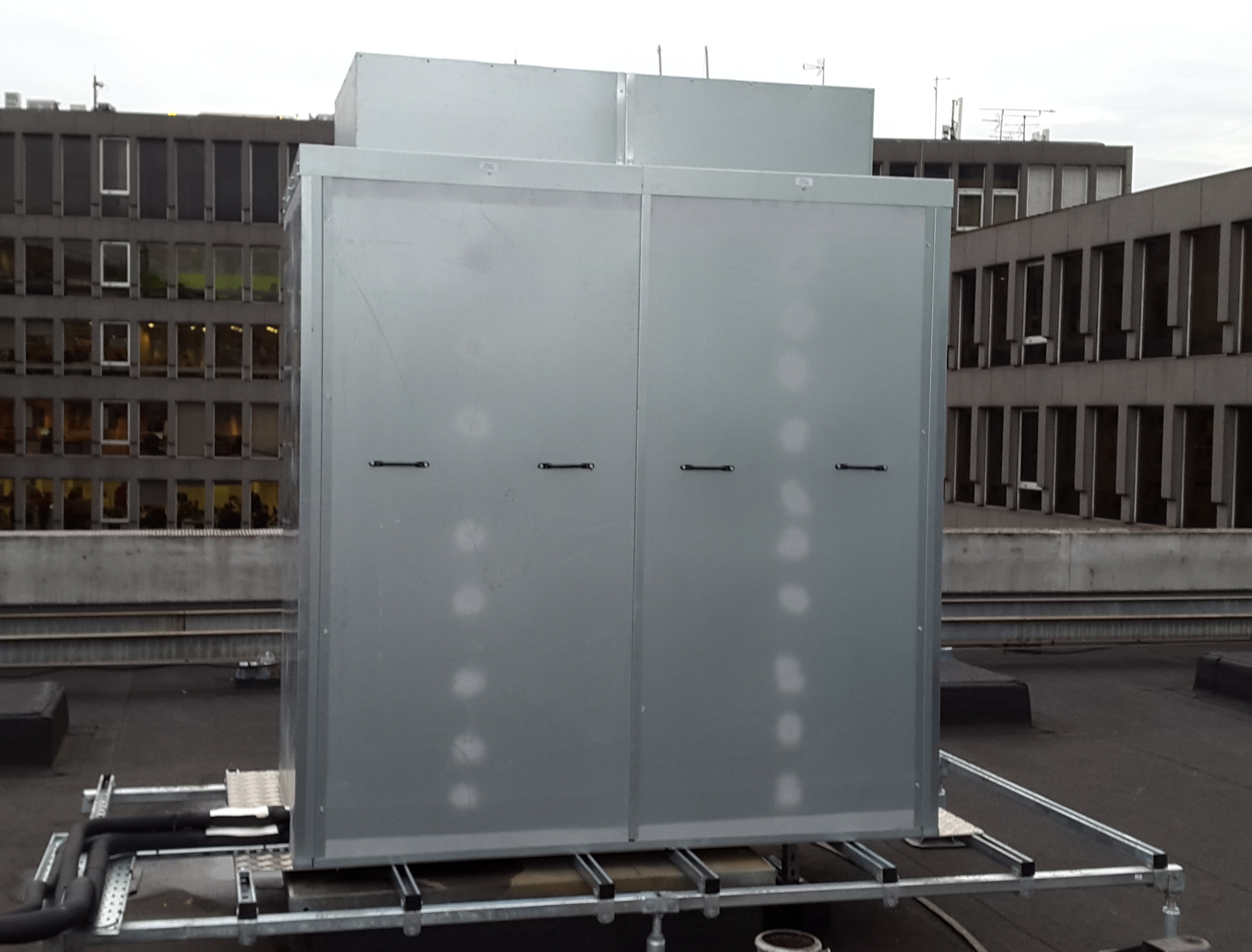 Free-standing enclosure fitted to Daikin unit